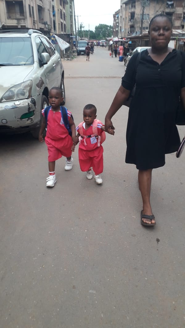 Morning school commute observed across Onitsha, Nigeria streets