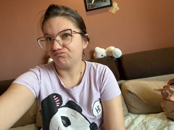 Woman takes morning selfie with breakfast in Sofia apartment
