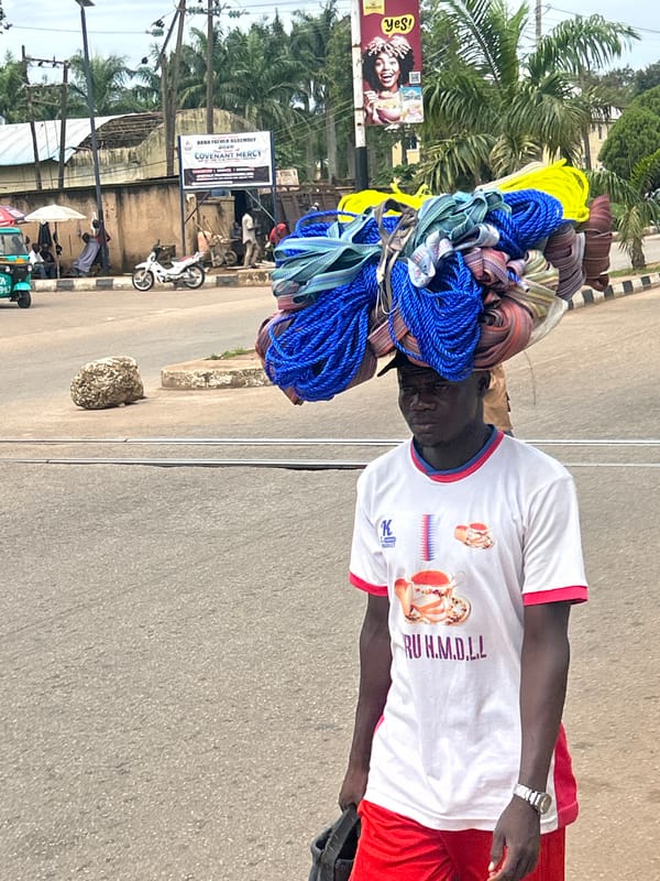 Street interactions and vendors on the move in Jos, Nigeria