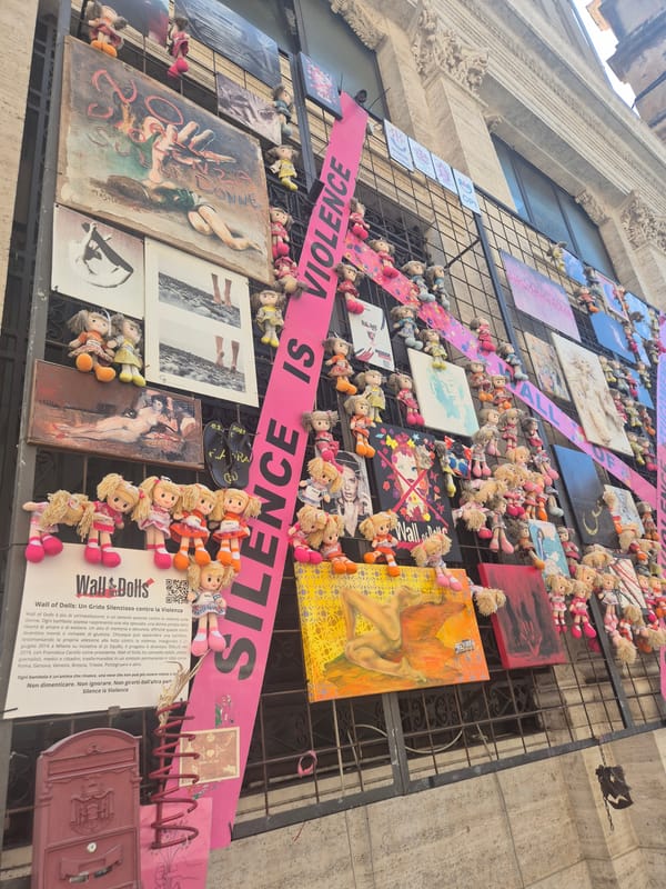 Wall of Dolls art installation documented in Genoa