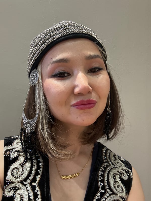 Cultural celebration and business meetings documented in Astana offices