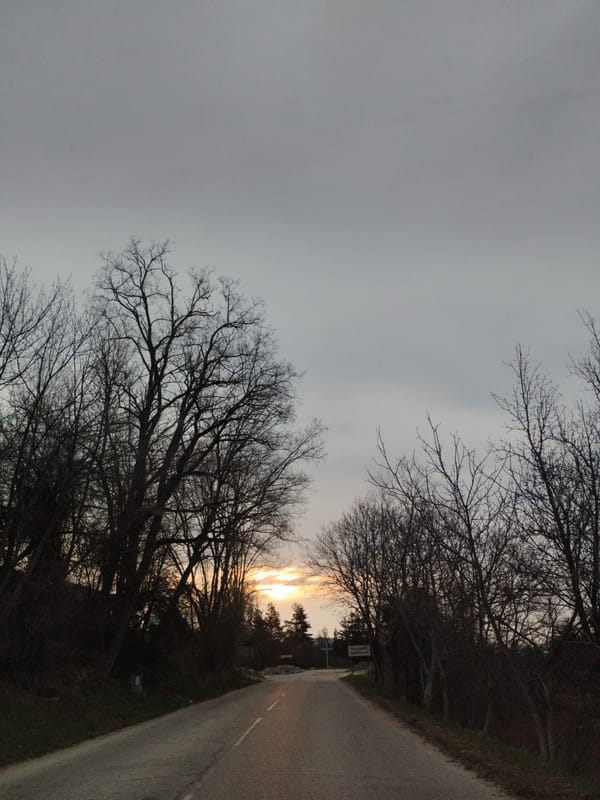 Overcast sunset road scene documented in Chokmanovo, Bulgaria