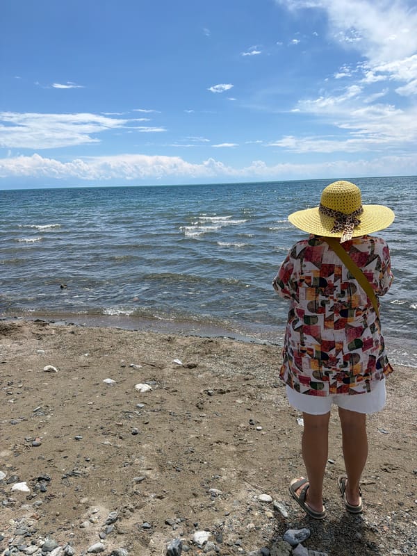 A laid-back beach day mixing shore time and paddleboarding.