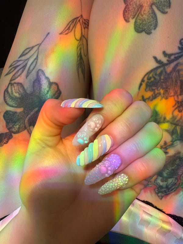 Pugs bask in rainbow light during quiet domestic moment