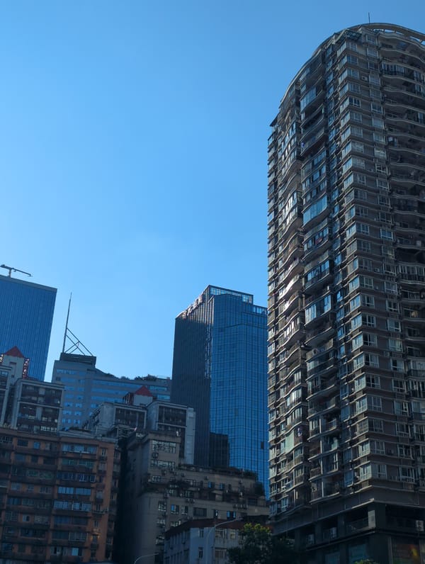 Yuzhong District streets and skyline on a clear summer morning