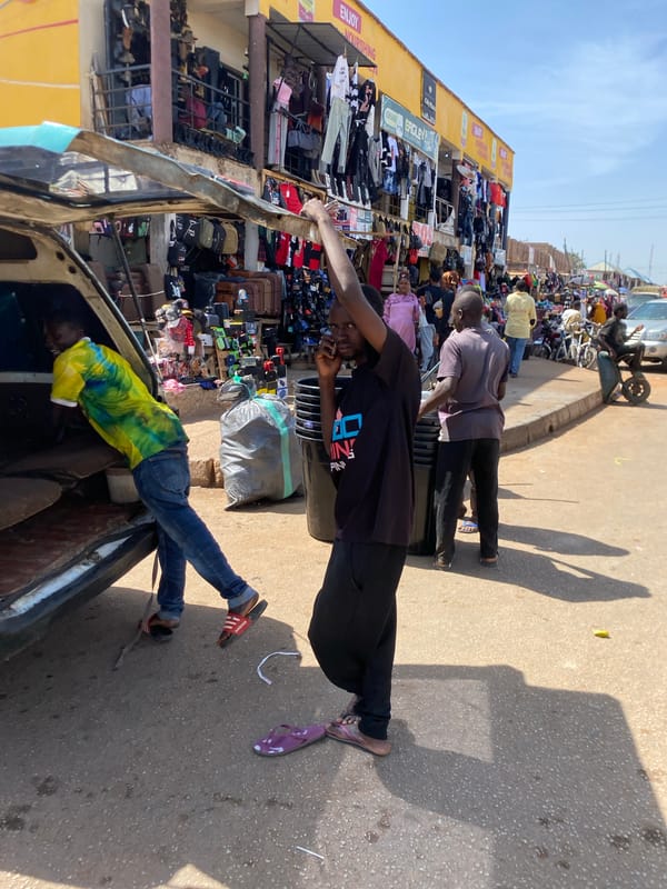 Daily life unfolds in Bukuru Nigeria's bustling midday markets