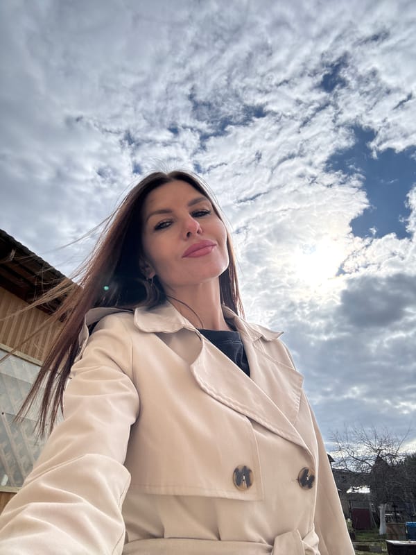 Quiet moments captured in Dubovaya: woman outdoors, kittens resting