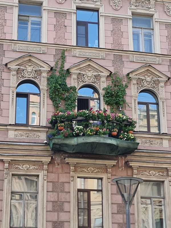 Classical pink building facade detail in Saint Petersburg