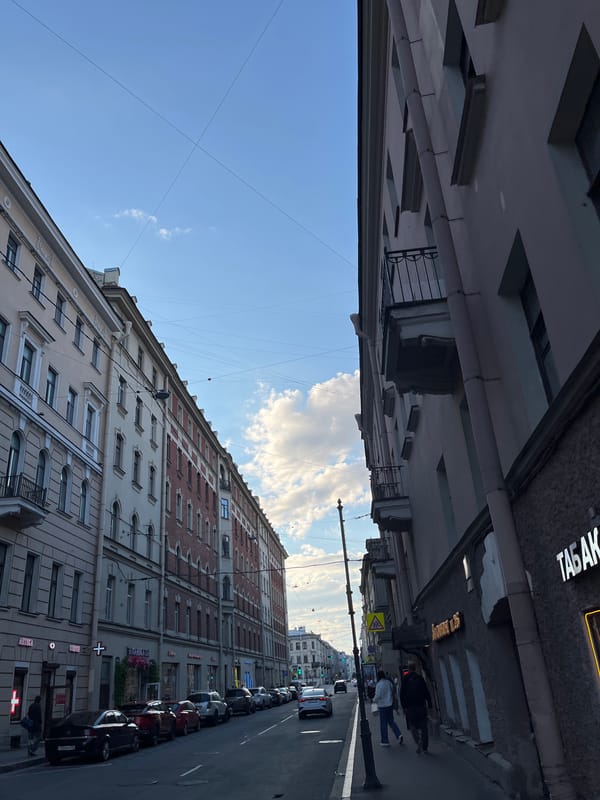Bar night in Saint Petersburg, framed by classic city streets