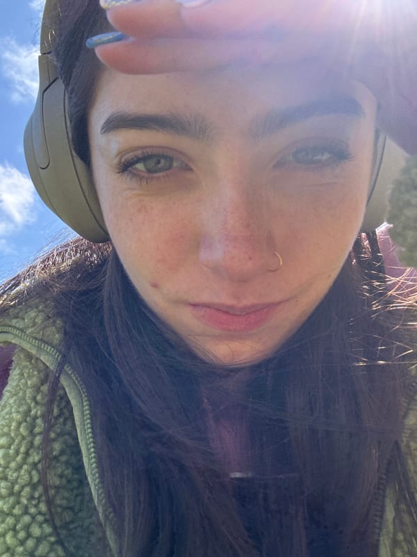 Woman takes selfie in Hull park among spring flowers
