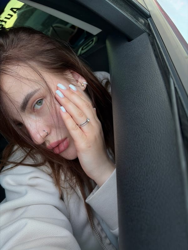 Woman takes selfies in car in Krasnodar, Russia