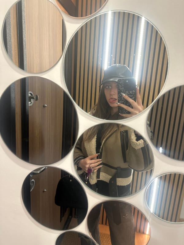Person takes selfie at mirror wall in Targovishte