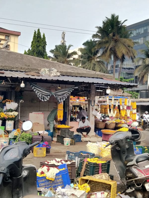 Early morning flower market activity documented in Panaji, India