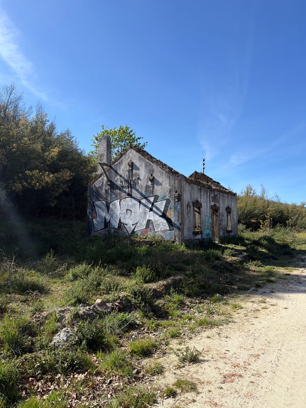 Damaged graffiti-covered building ruins documented in Vila Real Portugal
