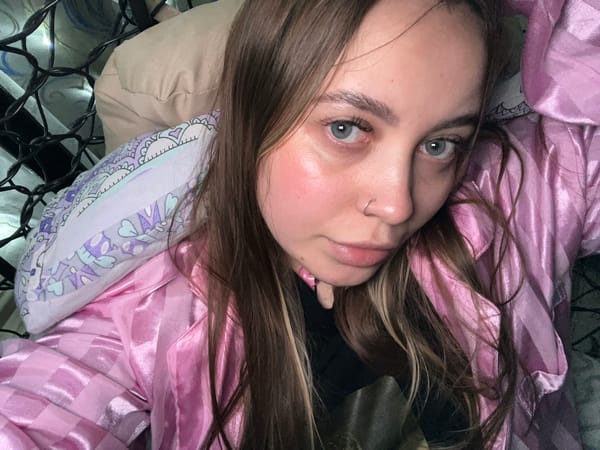 Woman photographed in bedroom in Novopokrovskaya, Russia