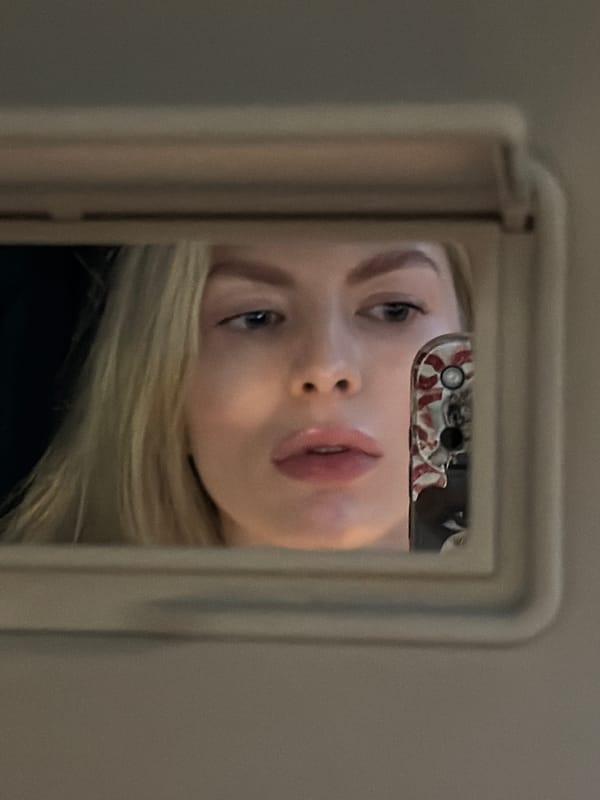 Rainy evening, Moscow car interior, mirror reflections.