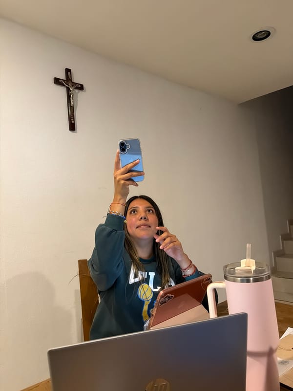Woman with stylus observed at table in Cholula
