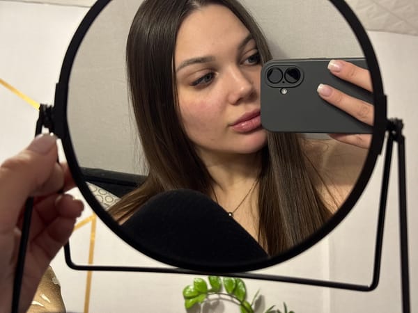 Woman takes artistic selfies in Chaikovsky bathroom