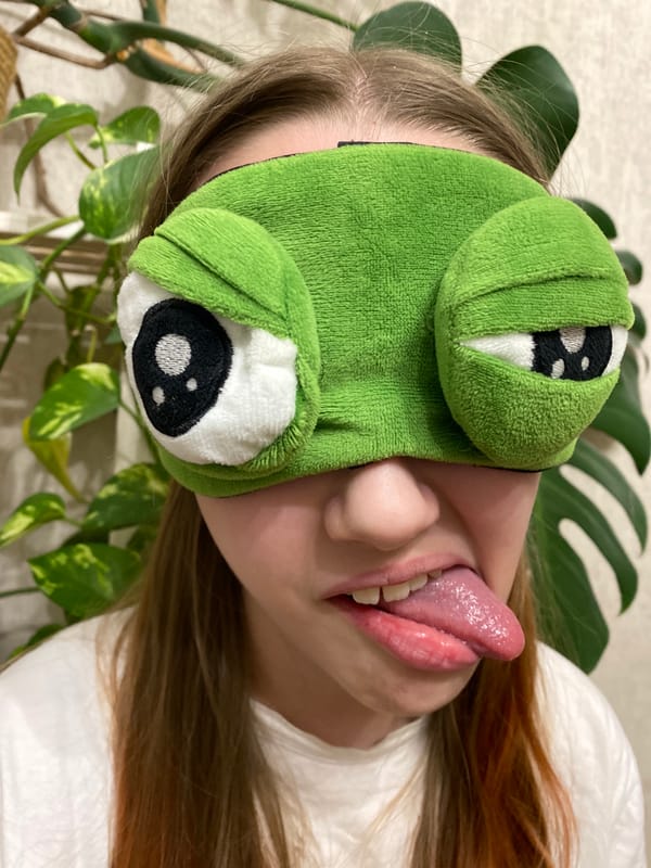 Child in Spider-Man costume plays in bedroom, Yekaterinburg