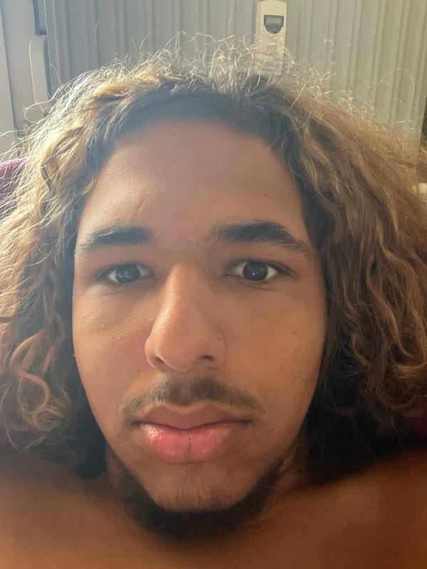 Man photographs himself making faces in Strasbourg apartment