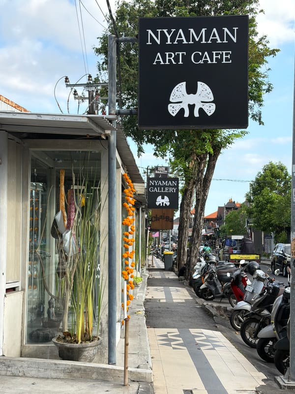 Morning walk through Kuta's commercial district captures local businesses