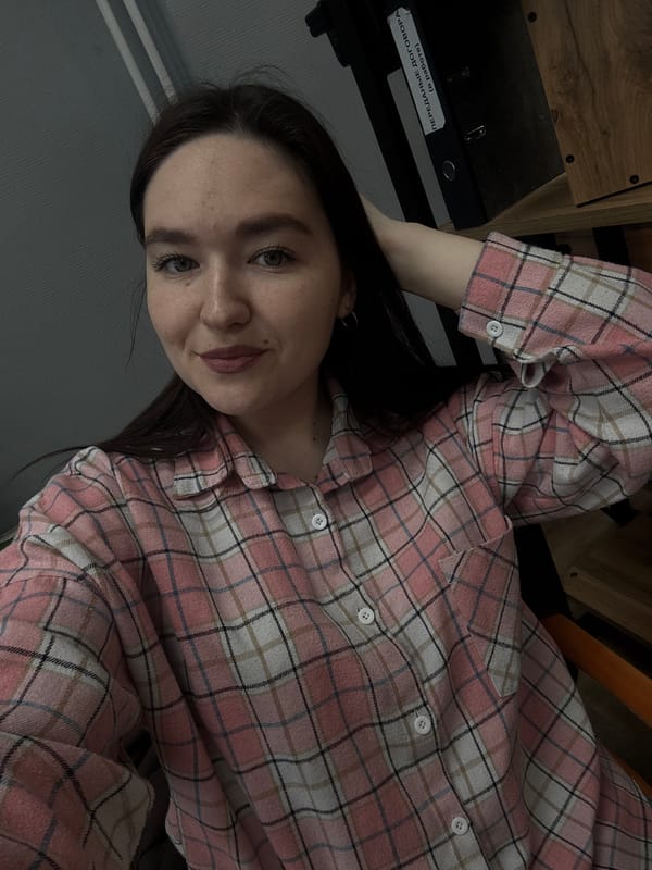 Woman photographed in office setting in Chaikovsky, Russia