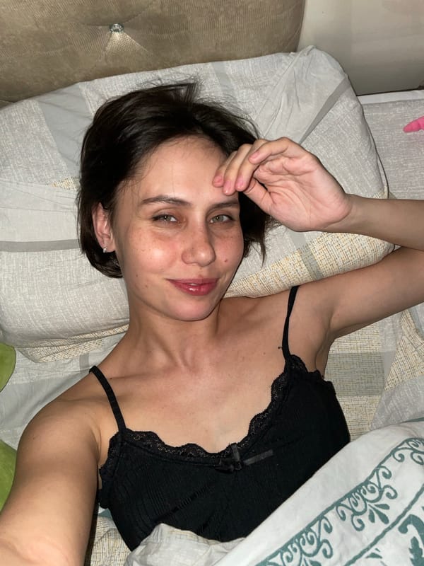 Woman resting in bed observed in Izhevsk, Russia