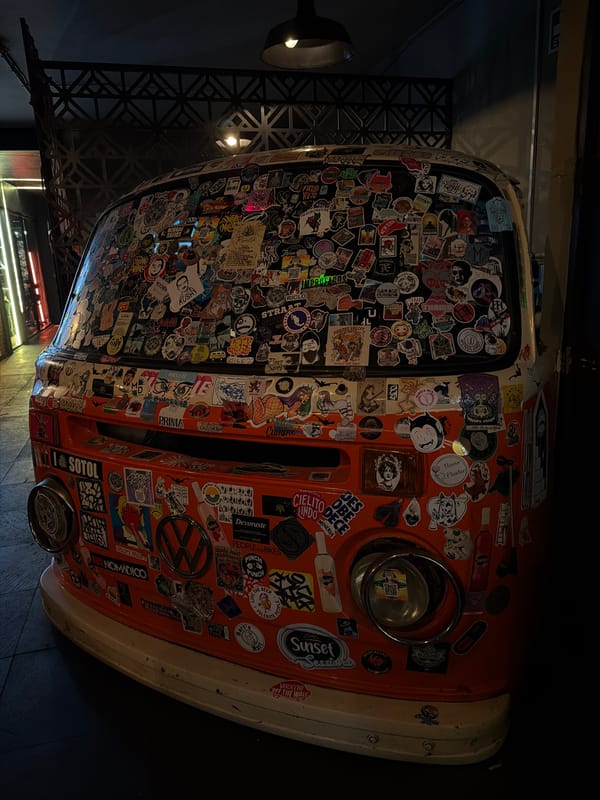 Sticker-covered orange VW van spotted near Mexico City bar