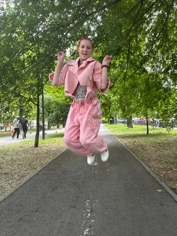 Person in pink outfit spotted on park pathway in Saratov
