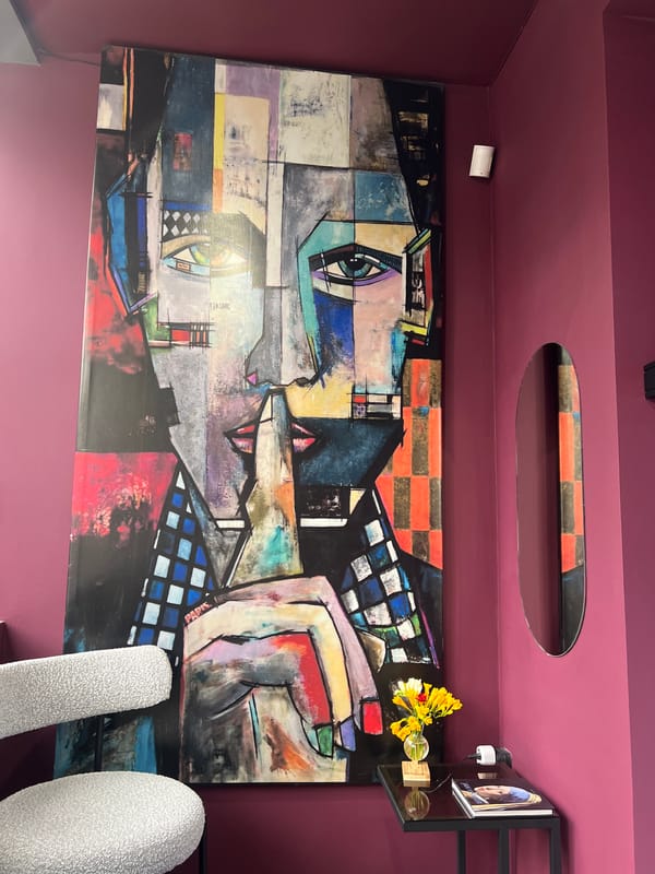Cubist-style abstract painting observed in Yerevan interior space