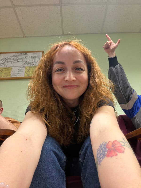 Woman takes indoor selfies with friends in Chaikovsky, Russia