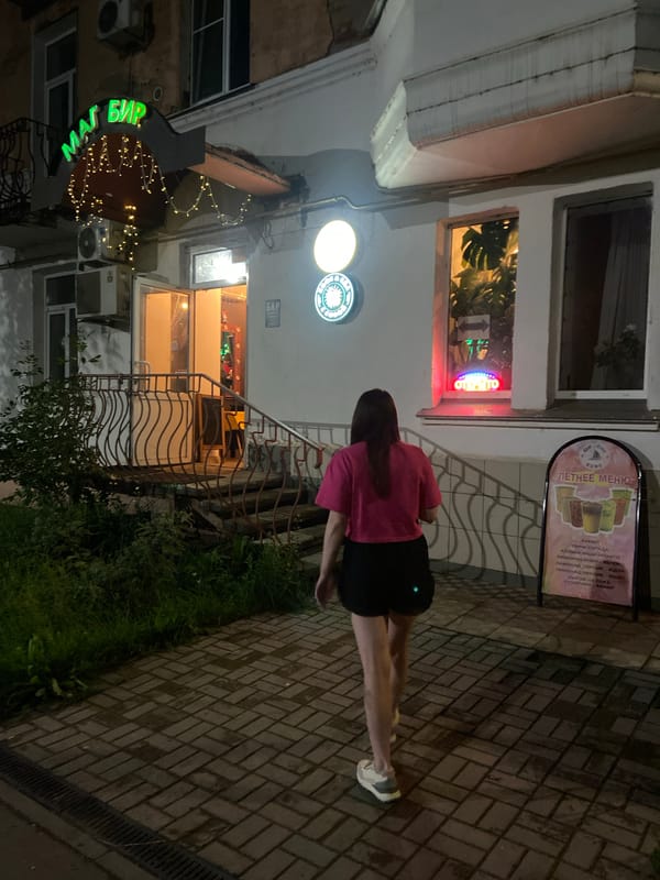 Night out at a neon-lit bar in Votkinsk, Russia