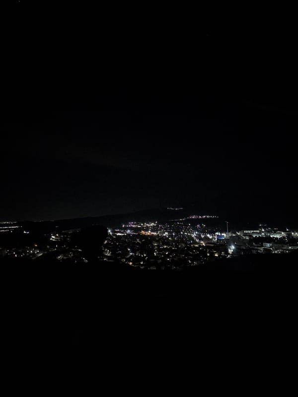 Night aerial photograph captures illuminated Peshtera, Bulgaria cityscape