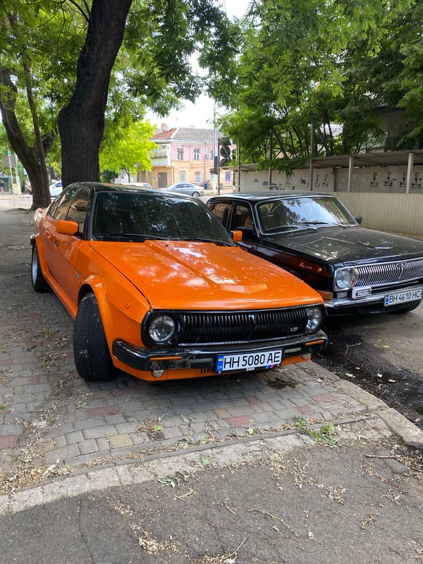 Vintage cars, civic landmarks, and street-level details from a midwestern outing