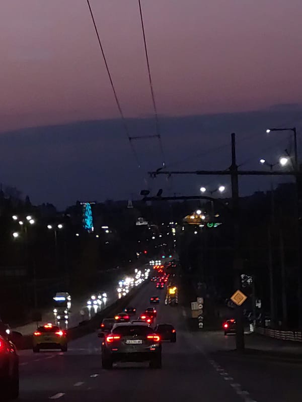 Evening traffic scene captured on Sofia street