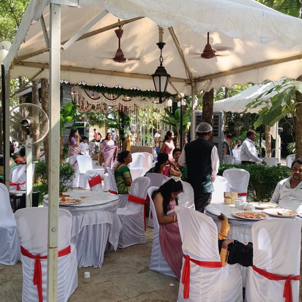 Wedding celebration captured in Mapusa, India with traditional decorations