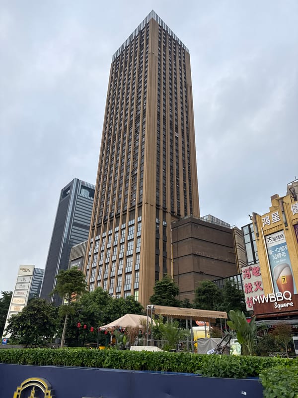 Haizhu District streets: lanterns, EVs, and everyday urban flow