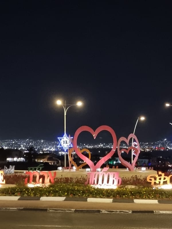 Nighttime scenes captured in Eilat: illuminated decorations, swimming pool