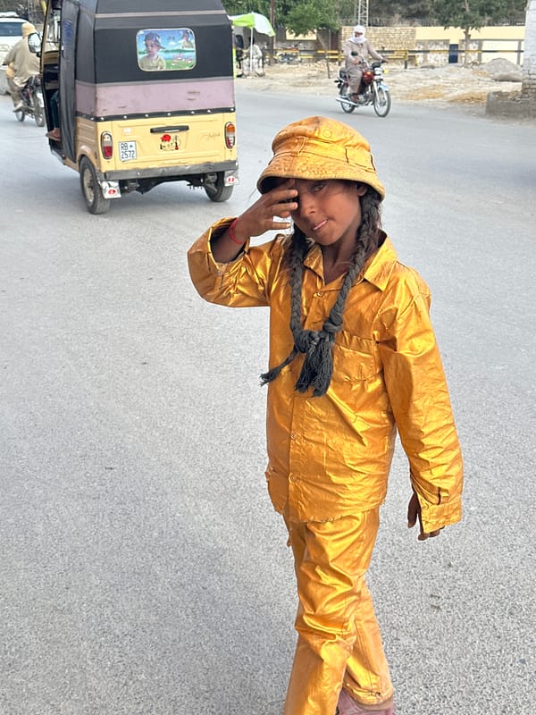 Gold-painted children in matching outfits spotted throughout Quetta streets