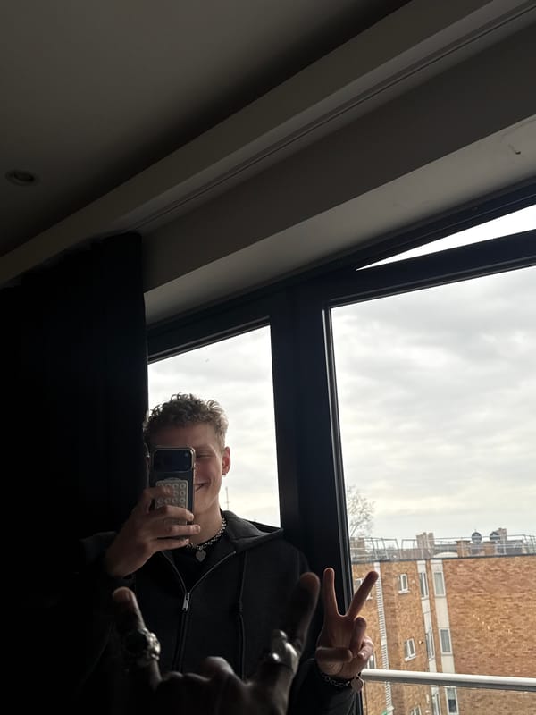 Person takes selfie, another spotted on metal flooring in London