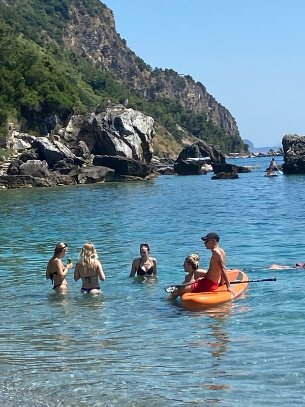 Sunny afternoon at a pebble beach on the Montenegrin coast