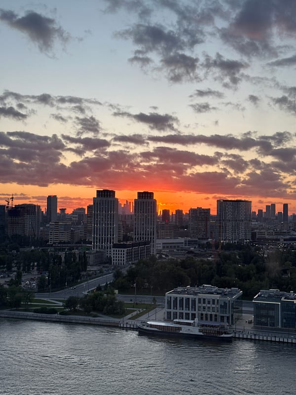Moscow skyline glows under a fiery summer sunset