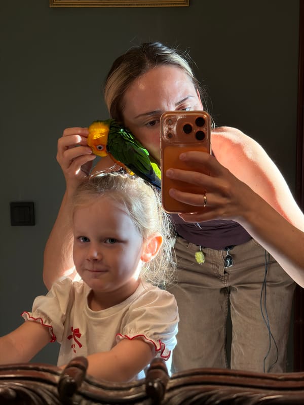 Mirror selfie with a small parrot, Khimki, Russia