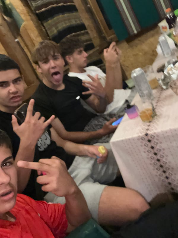 Young men gather for casual indoor social event with games