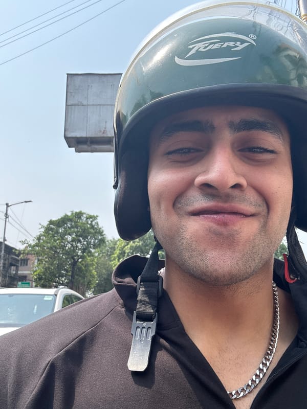 Motorcyclist in branded helmet photographed in Kolkata