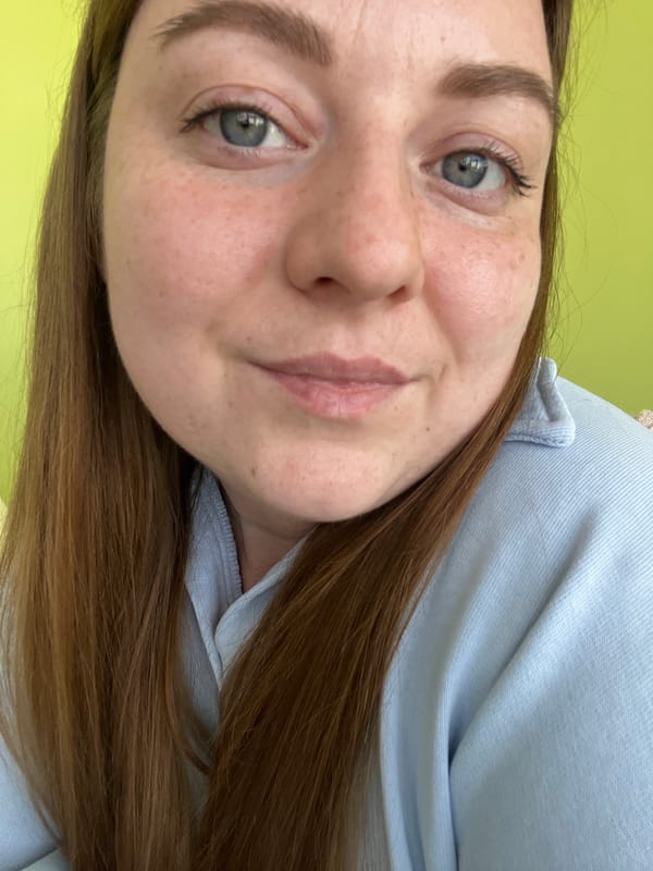 Woman documents workday with selfies at Klin office