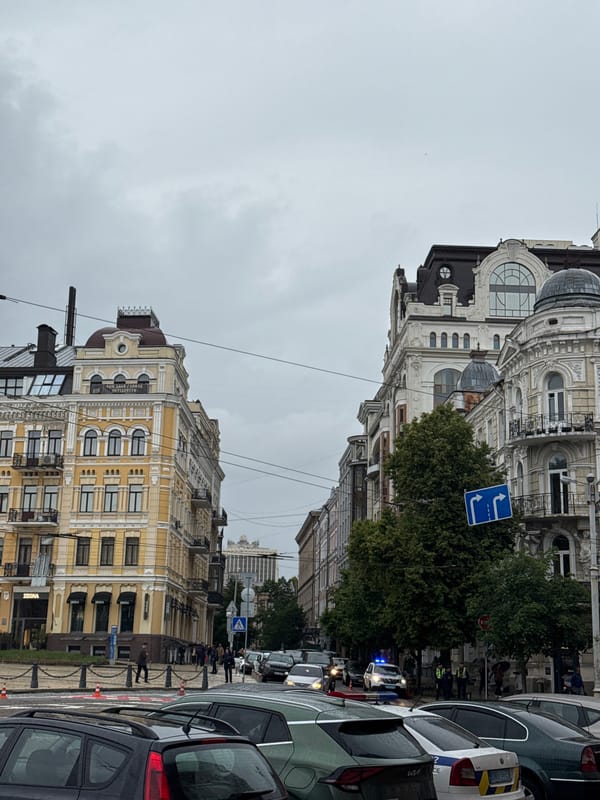Overcast afternoon scenes captured across central Kyiv streets