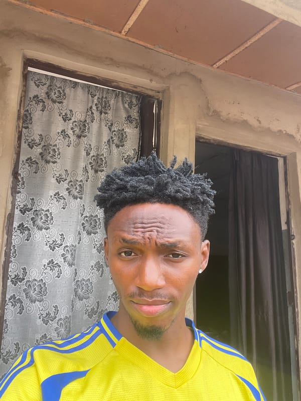 Man in athletic wear photographed indoors in Lokoja, Nigeria