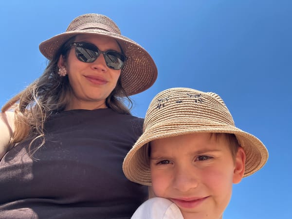 Mother and baby photographed near ocean in Kaş, Turkey
