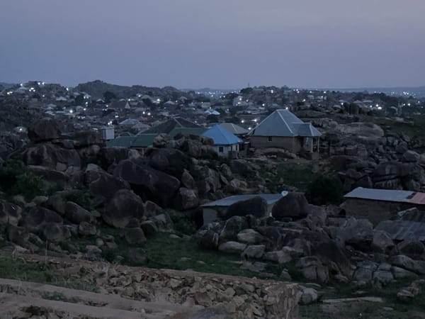 Dawn documentation of Jos Nigeria's rocky residential hillside community